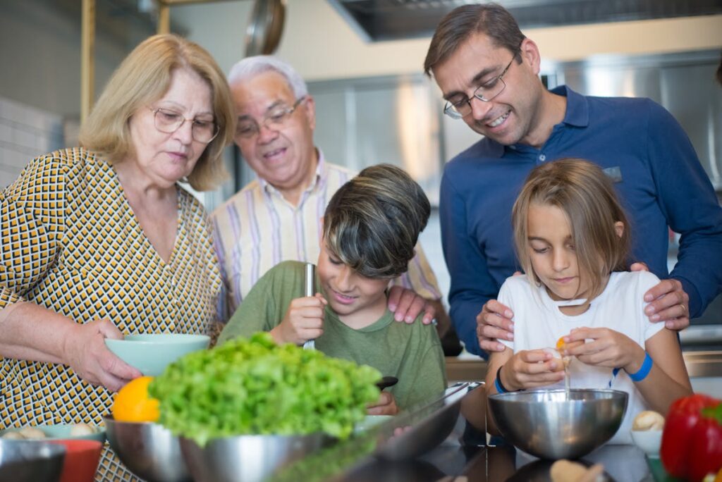 Family cooking together in the kitchen
